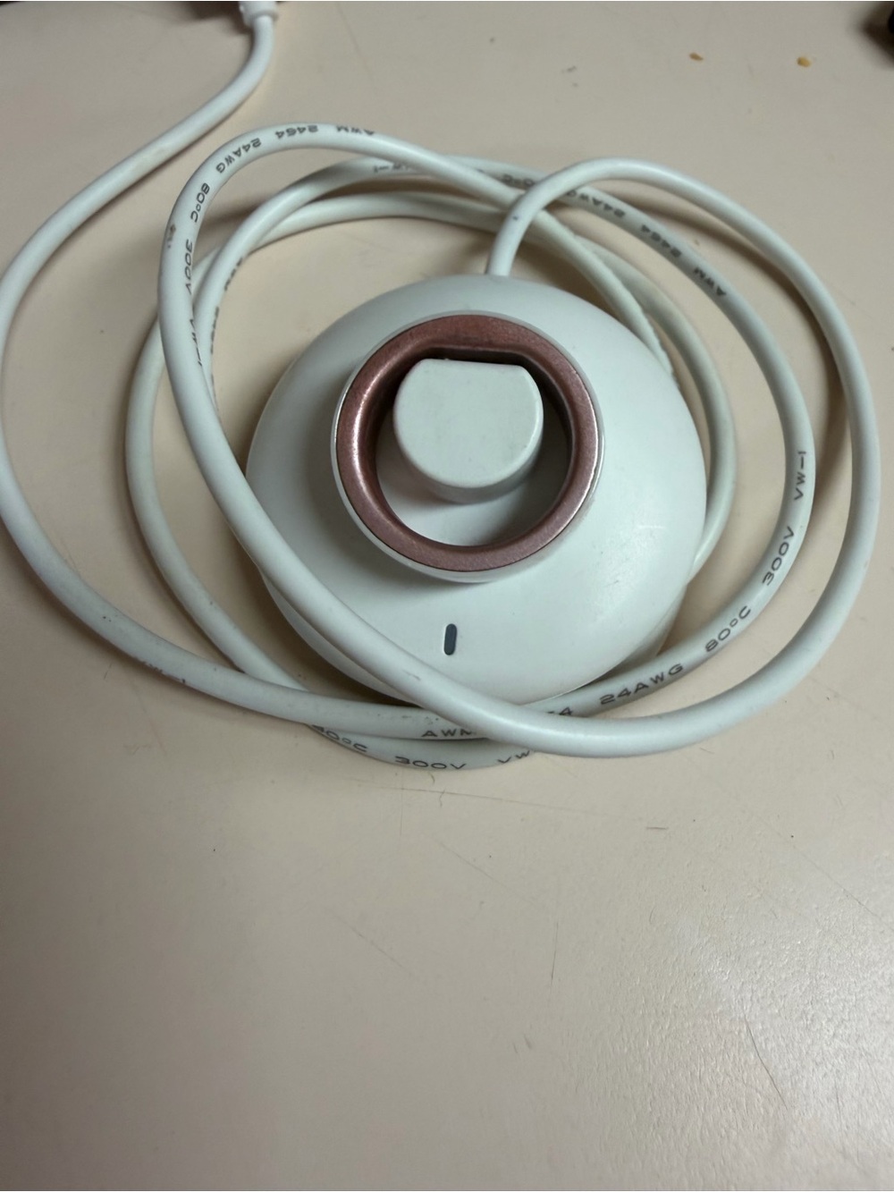 White Smart Wearable Ring Charger Dock with Rose Gold Accent